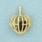 Heart Cage Pendant With Garnet Gemstone In 10k Yellow Gold