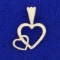 Diamond Cut Double Heart Pendant In 14k Yellow Gold