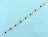 Garnet And Diamond Bracelet In 10k Yellow Gold