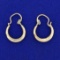 Small Drop Hoop Earrings In 8k Yellow Gold