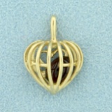 Heart Cage Pendant With Garnet Gemstone In 10k Yellow Gold