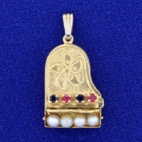 Vintage Grand Piano Design Ruby, Sapphire, And Seed Pearl Locket Pendant In 14k Yellow Gold