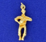 Man Holding Camera Pendant In 14k Yellow Gold