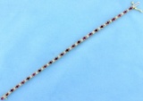 Natural Ruby And Diamond Tennis Bracelet In 14k Gold