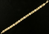 7 Inch Diamond Cut Designer Bracelet In 10k Yellow And White Gold