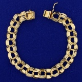 7 1/4 Inch Triple Loop Charm Bracelet In 14k Yellow Gold