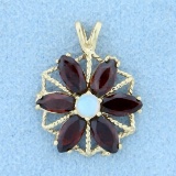 Garnet And Opal Pinwheel Design Pendant In 14k Yellow Gold