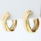 Twisting Hoop Earrings In 18k Yellow And White Gold