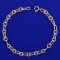 7 3/8 Inch Alternating Oval And Circle Cable Link Bracelet In 14k Yellow Gold