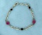 7 Inch Sterling Silver Avon Bracelet With Pink And Purple Crystal Stones