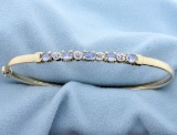 Tanzanite And Diamond Bangle Bracelet In 10k Yellow Gold With White Gold Accents