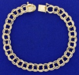 7 Inch Double Ring Link Charm Bracelet In 14k Yellow Gold