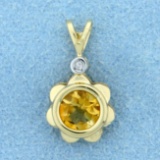 Citrine And Diamond Bezel Set Sun Or Flower Pendant In 14k Yellow Gold