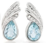 Pear Cut Sky Blue Topaz And Diamond Earrings In Sterling Silver