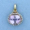 Amethyst And Diamond Pendant In 10k Yellow Gold