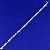 1ct Tw Round And Baguette Diamond Tennis Bracelet In 14k Yellow Gold