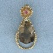 6ct Smoky Topaz And Ruby Pendant In 14k Yellow Gold