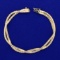 Italian-made 7 1/2 Inch Braided Double Strand Omega Bracelet In 14k Yellow Gold