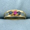 Three-stone Pink And Blue Sapphire Ring In 14k Yellow Gold