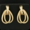 Diamond Cut Double Hoop Earrings In 14k Yellow Gold