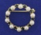 Vintage Pearl And Sapphire Circle Pin In 14k Yellow Gold