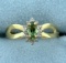 Diamond And Peridot Inifinity Design Ring In 10k Yellow Gold