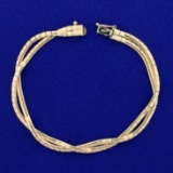 Italian-made 7 1/2 Inch Braided Double Strand Omega Bracelet In 14k Yellow Gold