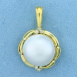 Large Mabe Pearl And Diamond Pendant In 18k Yellow Gold