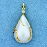 Pear Shaped Mabe Pearl And Diamond Pendant In 14k Yellow Gold