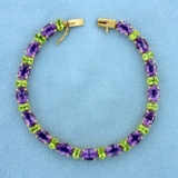 Amethyst And Peridot Line Bracelet In 14k Yellow Gold
