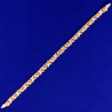7 Inch Heart Link Bracelet In 10k Yellow And Rose Gold