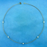 18 Inch Akoya Pearl Wire Necklace In 14k Yellow Gold
