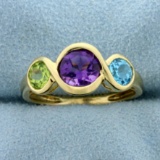 2ct Tw Amethyst, Sky Blue Topaz, And Peridot Ring In 14k Yellow Gold