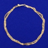8 Inch Triple Strand S-link Bracelet In 14k Yellow Gold