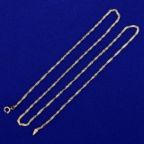 21 Inch Twisting Curb Link Neck Chain In 14k Yellow Gold