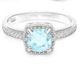 Sky Blue Topaz And Diamond Halo Style Ring In Sterling Silver