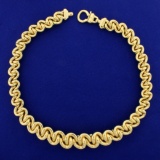 Italian Made Large Tapering Twisted Loop Link Neck Chain In 14k Yellow Gold