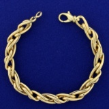 Heavy Italian Made Designer Twisting Link Bracelet In 14k Yellow Gold