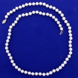24 Inch 6.6mm Cultured Akoya Pearl Necklace In 14k Yellow Gold