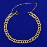 Double Loop Charm Bracelet In 14k Yellow Gold