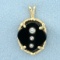 Onyx And Diamond Pendant In 14k Yellow Gold