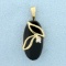 Onyx And Diamond Pendant In 14k Yellow Gold