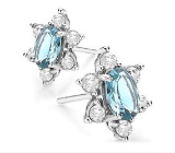 Sky Blue Topaz & White Topaz Flower Stud Earrings In Sterling Silver