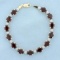 Garnet And Diamond Line Bracelet In 10k Yellow Gold