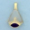 Abstract Amethyst, Diamond, And Camphor Glass Pendant In 14k Yellow Gold