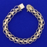 7 3/4 Inch Double Flower Design Bracelet In 14k Yellow Gold