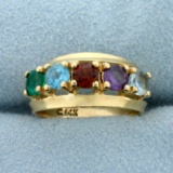 Emerald, Aquamarine, Purple Sapphire, Garnet, And Blue Topaz Ring In 14k Yellow Gold