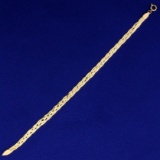 7 Inch Braided Herringbone Link Bracelet In 14k Yellow Gold