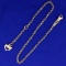 10 Inch Dolphin Charm Anklet In 14k Yellow And White Gold