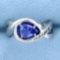 Diamond And Tanzanite Infinity Ring In 14k White Gold